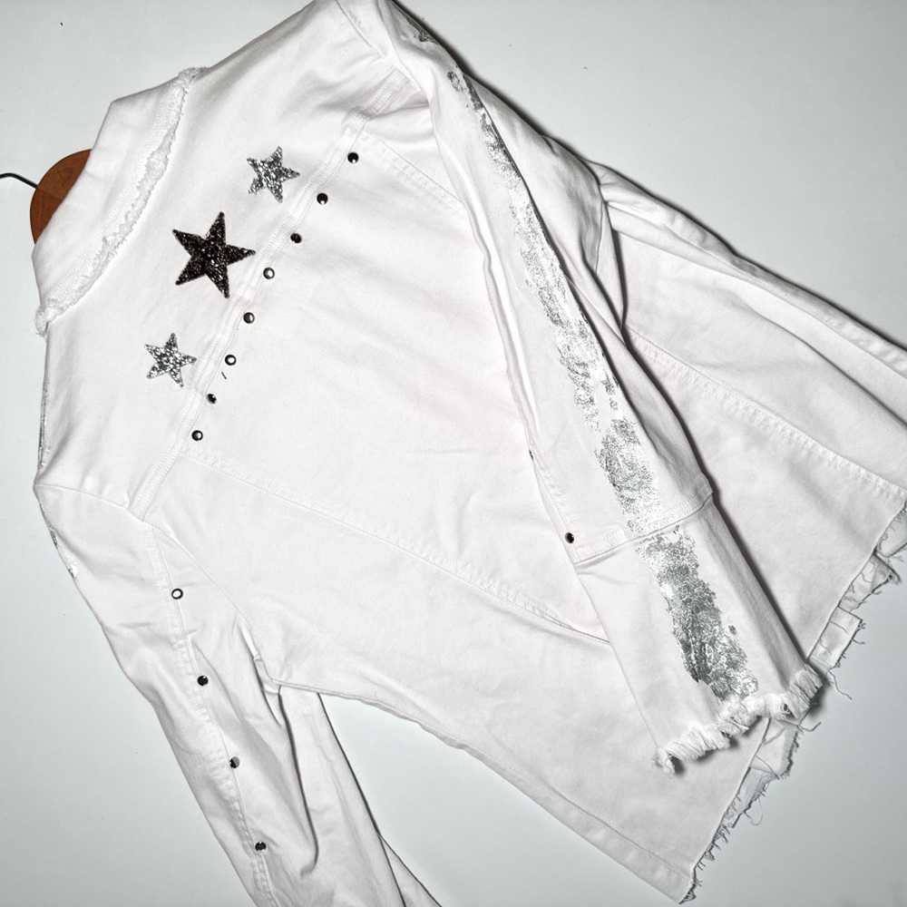 White denim jacket with silver stars and sequins, featuring a handcrafted jacket